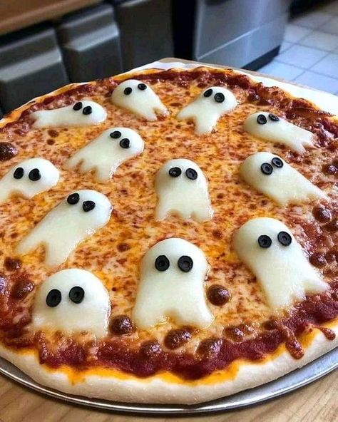 Halloween Forever | Halloween Ghost Pizza 👻🍕 | Facebook Ghost Pizza, Weird Food, Halloween Recipes, Pizza Sauce, Shredded Mozzarella, Pizza Crust, Halloween Ghost, Mozzarella Cheese, Halloween Ghosts