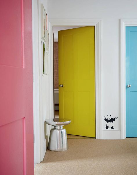 In this project, the interior designer [link url="https://www.houseandgarden.co.uk/article/henri-fitzwilliam-lay-house"]Henri Fitzwilliam-Lay[/link] had the doors of three children’s rooms painted in different pastel colours to make the landing feel ‘playful and whimsical’. This would work equally well in a more grown-up space, using darker or more muted tones. It is a clever way to perk up a small area in which the opportunities for decorating are more limited. Colored Doors Interior, Paint Doors Interior, Colourful Rooms, Painted Bedroom Doors, Interior Door Color, Colored Doors, Interior Door Colors, Hallway Door, Painted Interior Doors