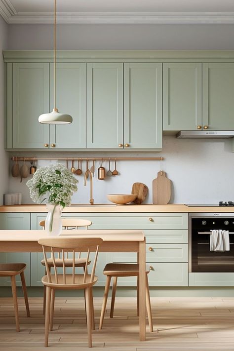 Sage Green Kitchen Cabinets: A Fresh Take on a Classic Look Vogue Decor, Best Kitchen Colors, Sage Green Kitchen, Green Kitchen Cabinets, Wall Decor Kitchen, Kitchen And Bath Remodeling, Organization Kitchen, Casa Country, Inspiration Kitchen