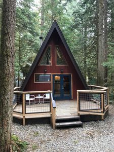 Rustic 70's A-Frame with a cozy modern interior. - Glacier Rustic A Frame Cabin, A Frame Cabin Interior, Cozy Modern Interior, Mount Baker, Frame Cabin, A Frame Cabin, Woodland Garden, Tiny House Plans, Mountain House