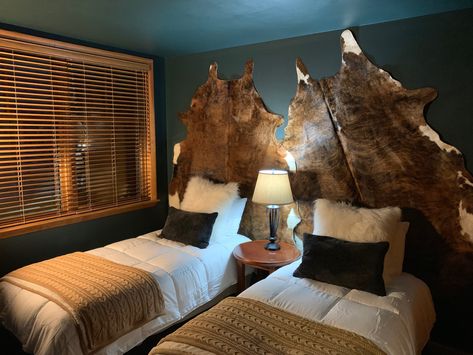 Brindle cow hides hung on wall in bunk room Deer Hide On Wall, Cowhide On Wall, Cowhide On Wall Ideas, Room Western, Chalet Ideas, Deer Heads, Cowboy Chic, Western Bedroom, Brindle Cowhide