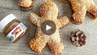 19K views · 600 reactions | Nutella Stuffed Pastry Gingerbread Men 😍 | Nutella Stuffed Pastry Gingerbread Men 😍 These pastries are so light and crisp! They’re stuffed with Nutella and topped with icing sugar 🤤 They got 41... | By Fitwaffle | Facebook Stuffed Pastry, Nutella Spread, Gingerbread Cookie, Candy Desserts, Icing Sugar, Gingerbread Men, Work Place, Egg Wash, Puff Pastry