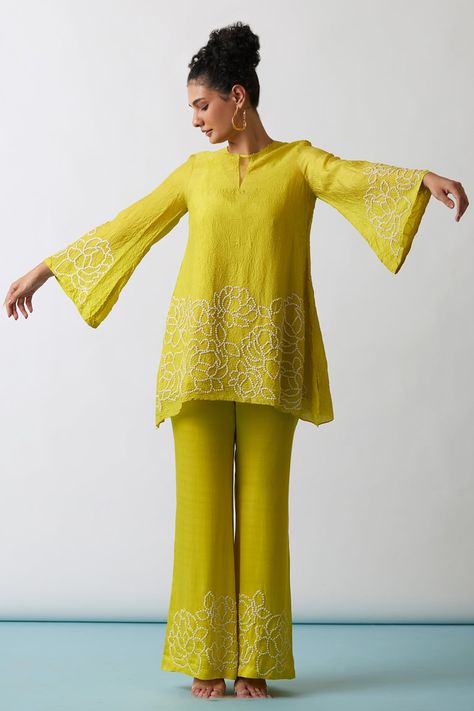 Shop for these amazing collections of Yellow Kurta Viscose Silk Hand Embroidered Floral A-line Short And Pant Set For Women by One Not Two online at Aza Fashions. Modal Satin Kurti, Short Kurti Salwar Suit, Pant And Short Kurti Designs, Kurti Pant Set Design, Short Kurti Pants Design, Bottom Designs For Suits, Short Kurta And Pants Women, Short Kurti And Pants Outfit, Tunic For Women