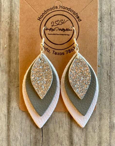 "NEW - White, Grey & Silver Leaf Dangle Faux Leather Lightweight Earrings | Beautiful Handmade Earrings | PU Faux Leather | Regular-Solid Size Earrings | Each Piece is Double-Sided  - Measurements: Length \"2.75\" inch  Drop \"2.25\" inch  Width \"1.10\" inch  - *All Handmade and Handcrafted Earrings are faux leather and are made with hypoallergenic hooks for sensitive ears & Nickel-Free * *925 Sterling Silver Hypoallergenic Hooks" Diy Earrings Leather Ideas, Scrap Leather Earrings, White Leather Earrings, Diy Leather Earrings Tutorials, Leather Cricut Earrings, Handmade Leather Earrings Ideas, Making Leather Earrings, Faux Leather Earring Ideas, Leather Earring Ideas