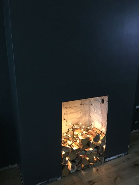 Fire logs with fairy lights Fairy Light Fireplace Ideas, Fireplace With Fairy Lights, Fireplace Fairy Lights Ideas, Fairy Lights Fireplace Ideas, Fairy Lights Fireplace, Fireplace Filler, Wood Burner Fireplace, Fake Fire, Fake Fireplace