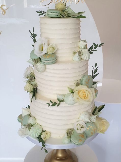 Buttercream wedding cake Sage mint green wedding cake with macarons meringue kisses and fresh flowers at Prested Hall Essex wedding venue Sage Cake Wedding, Sage Green Quince Flowers, Cakes With Green Decorations, Mint Green Wedding Cake Ideas, Sage Green Theme Wedding Cake, Wedding Cake Ideas Sage Green, Quincera Themes Ideas Sage Green, Wedding Cake Mint Green, Sage Theme Wedding Cake