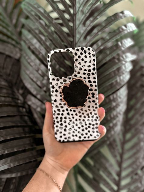 Speckled dotted antelope print phone iphone 14 pro max case. Black gemstone pop socket with gold trim. Boho neutral inspired phone. Boho neutral phone accessories. Boho phone case Phone Case Pop Socket, Antelope Print, Boho Phone Case, Popsockets Phones, Phone Things, Accessories Boho, Ring Pop, Pop Socket, Gold Trim