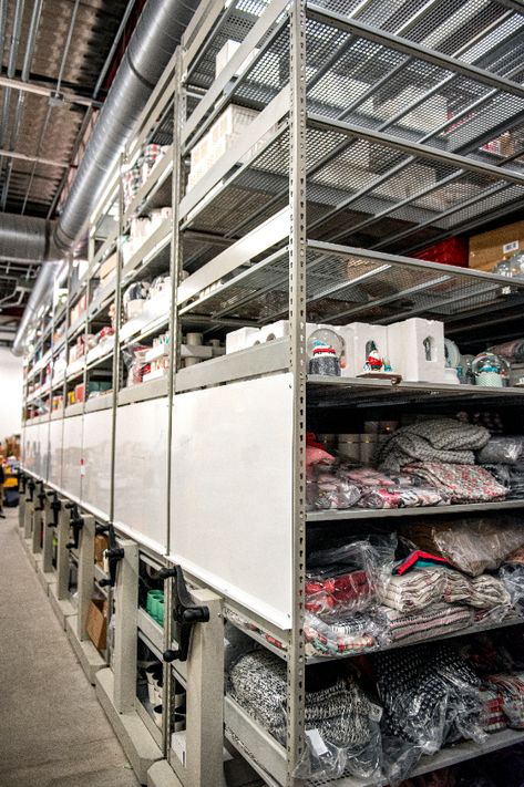 This is a fantastic way to organize a back room in a retail store.  This system is called High Density storage and it can make your life so much easier! #retail #retailstorage #retailshelving #retailbackroom #storagesolution #storage #spacefile #shelving #compactstorage #rollingstorage Warehouse Retail Design, Retail Storage, Warehouse Organization, High Density Storage, Ranger Station, Back Room, Storage Products, Retail Shelving, Rolling Storage