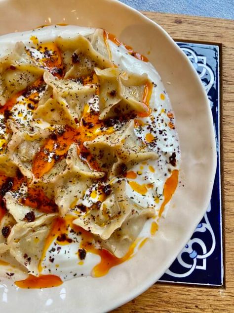 Vegetarian Manti, Turkish dumplings with sautéed onions, chickpeas and spices | Ozlem's Turkish Table Turkish Food Manti, Turkey Food Photography, Turkish Cuisine Aesthetic, Turkish Aesthetic Food, Vegetarian Turkish Recipes, Turkish Food Photography, Turkish Food Aethstetic, Turkish Dinner Table, Turkish Dumplings