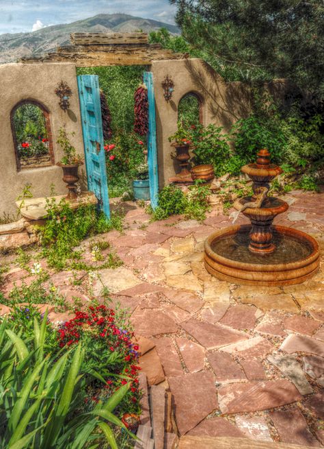 New Mexican courtyard... Love the flagstone! Mexican Courtyard, Spanish Courtyard, Mexican Garden, Spanish Hacienda, Hacienda Style Homes, Blue Doors, Adobe House, Santa Fe Style, Mexican Home