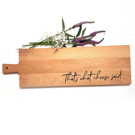 Our new Thats what cheese said Charcuterie Board is available in a variety of sizes and types of wood. Choose between Beech wood Paddles, Geometric Walnut or unique Olive wood. They are ideal for serving Fresh bread, meats, artisanal cheese and more. Customizable Charcuterie Boards are excellent wedding,Fathers Day or Housewarming gifts. They are also great for the best dad ever, that special someone, or your best friend. A Variety of Our boards have a contoured handle making carrying that perfectly prepared charcuterie plate easy and comfortable.  These beauties are engraved  when ordered so they take around 3 to 5 business days to process.If you would like any changes to the design, Message Us or Place the request in the comment section when you place your order. Each piece of wood is un Thats What Cheese Said Board, Personalised Cheese Board, Charcuterie Engraving Ideas, Charcuterie Board Business Pricing, Charcuterie Sayings, Charcuterie Logo, Funny Charcuterie Board, Charcuterie Board Design, Charcuterie Business