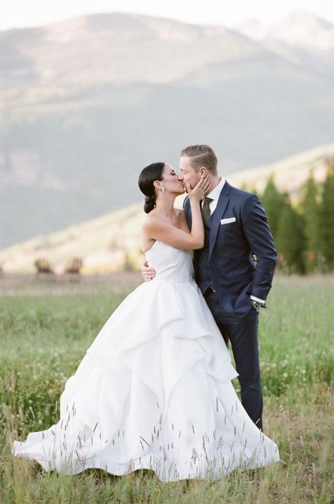 Wedding couple kissing in Vail, Colorado with backdrop of mountains | vail wedding, vail colorado summer, vail colorado, colorado wedding, colorado wedding venues, colorado wedding elopement, colorado wedding photography, colorado wedding ideas, vail colorado summer, vail colorado wedding, 10th vail, romantic, elegant, summer, modern, blush, outdoor, winter, candles, table scapes, ideas, spring, flowers, luxury | Tamara Gruner Photography - Destination Wedding Photographer Vail Colorado Summer, Wedding Venues Colorado, Colorado Wedding Elopement, Winter Candles, Vail Wedding, Getting Married Abroad, Colorado Summer, Couple Kissing, Wedding Colorado