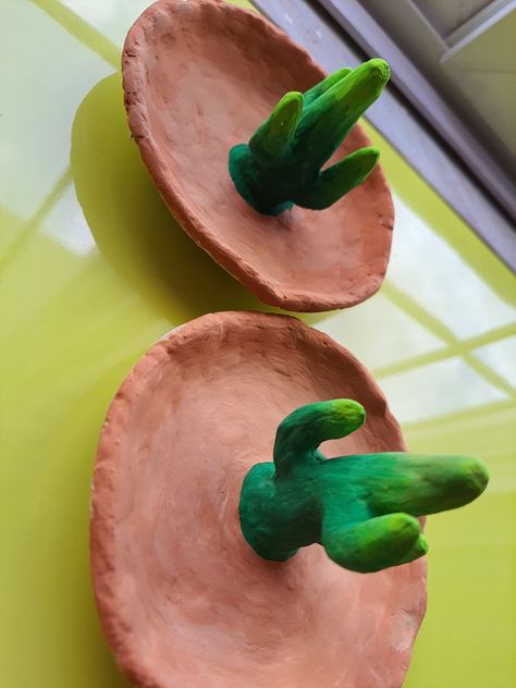 It's a cactus shaped jewelry holder, ideal for storing rings. It is made out of paper mache Small Rings, Jewelry Holder, Paper Mache, Ring Holder, Product Design, Making Out, Serving Bowls, Cactus, Handmade Jewelry