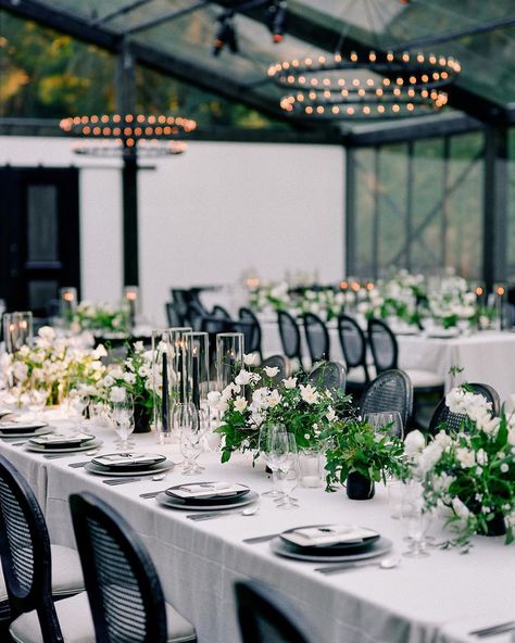 Martha Stewart Weddings on Instagram: “This couple wanted "a clean, modern tent that felt more like a hip urban restaurant," they say, so they requested black stained wood beams…” Black White Outdoor Wedding, Black Tent Wedding, Black And White Tent Wedding, Theoni Collection, White Wedding Table Setting, Stained Wood Beams, White And Black Wedding, Black And White Party, Black And White Wedding Theme