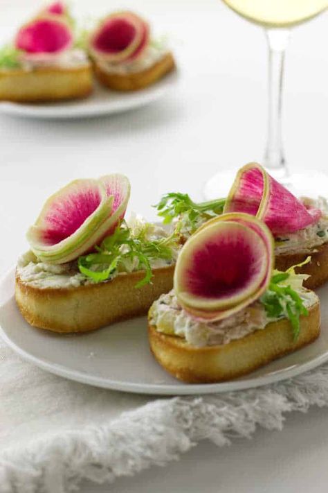 Watermelon Radish and Goat Cheese Crostini Cheese Crostini, Holiday Party Appetizers, Goat Cheese Crostini, Crostini Appetizers, Gluten Free Puff Pastry, Creamy Goat Cheese, Preserved Lemon, Crostini Recipes, Festive Appetizers