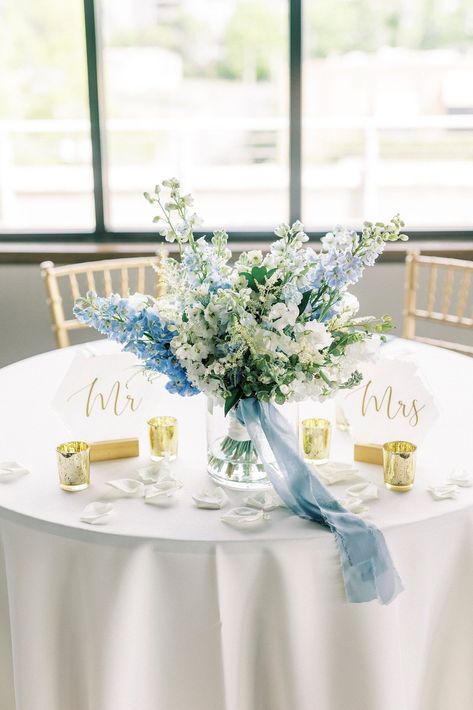 bride's blue and white floral bouquet sits in vase on sweetheart table at the Terrace at Cedar Hill | Uptown Charlotte Wedding at the Terrace at Cedar Hill photographed by NC wedding photographer Kevyn Dixon Photography Sweetheart Table Centerpiece, Sweetheart Table Flowers, Blue Wedding Centerpieces, Blue White Weddings, Head Table Wedding, Sweetheart Table Wedding, Wedding Reception Flowers, Wedding Reception Centerpieces, Wedding Floral Centerpieces