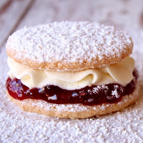 Small round discs of delicate sponge cake with jam and fresh cream in the centre and dusting of icing sugar. Ingredients: 1/3 self raising flour, 1/3 caster (superfine) sugar, 3 eggs (separated),... Cake With Jam, Vanilla Desserts, Icing Sugar, Small Cake, Fresh Cream, Savoury Cake, Sponge Cake, Tea Recipes, Mini Cakes