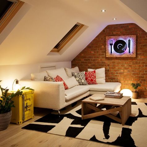 We converted this loft into a fun games room featuring a pool table and TV snug area. Swipe to see the custom-made pendant. Photographer: Roman Skyva #paullangstoninteriors #interiordesign #spaceplanning #interiors #bespokefurniture #furnituredesign #loftconversion Loft Snug Room, Loft Conversion Cinema Room, Games Room Attic, Loft Gaming Room, Attic Tv Room Sloped Ceiling, Tv Sports Room, Loft Conversion Games Room, Attic Tv Room, Tv Snug