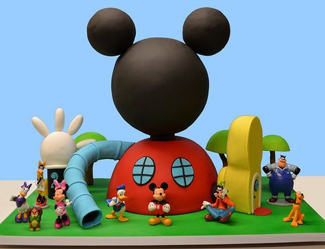 Mickey Mouse Club House Cake with Toy Characters. www.lovelycakes.net Mickey Mouse Torte, Goofy Birthday, Mickey Mouse Clubhouse Cake, Mickey Mouse Club House, Mickey Mouse House, Mickey And Minnie Cake, Mickey 1st Birthdays, Mickey Mouse Birthday Cake, Mickey Clubhouse