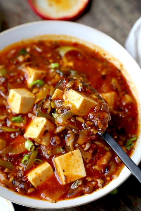 Vegan Mapo Tofu Recipe - Make this mapo tofu at home and never order it again! Mushrooms make this vegan mapo tofu recipe tastier and healthier than the ground meat version. Plus, they crank the level of umami up to 11! tofu recipe| Chinese food recipe | Szechuan Food | spicy tofu recipe | Asian Food Recipes | pickledplum.com Ital Recipes, Vegan Mapo Tofu Recipe, Mapo Tofu Recipe, Tofu Recipes Vegan, Vegan Asian Recipes, Chinese Recipe, Mapo Tofu, Tofu Recipe, Tofu Dishes