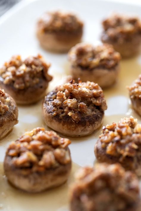 These effortlessly elegant Pork Stuffed Mushrooms will be devoured at any party. Tender mushroom caps are generously filled with savory pork, enriched with the warming spices of cinnamon and nutmeg, and a dose of toasted fennel seed for the perfect pre-dinner bite. Pork Stuffed Mushrooms, Baked Stuffed Mushrooms, Crockpot Apple Crisp, Appetizer Table, Appetizers Table, Dessert Waffles, Puff Pastry Filling, Creamy Crab, Stuffed Mushroom