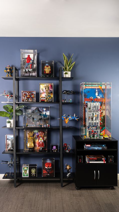 Large collectible display featuring numerous Marvel collectibles Marvel Figures Display, Lego Marvel Display, Toy Collector Room Ideas, Collectibles Display Ideas, Lego Room Display, Toy Collection Display Ideas, Lego Shelf Ideas, Collectible Display Ideas, Lego Showcase