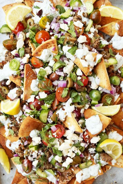 These Greek Nachos are easy to make and are a great upgrade and new twist to the classic appetizer/snack. Make it this summer for your friends and family! Lamb Nachos, Greek Nachos, Chicken Salsa, Feta Recipe, Homemade Nachos, Spiced Lamb, Marinated Tomatoes, Stuffed Potato Balls, Classic Appetizers