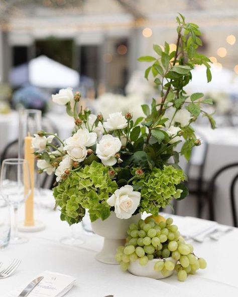 WILD FLOS on Instagram: "🍇 Stylist @weddingsofdesire Photographer @louisetreacyphotography" Fruit In Flower Arrangements, Cocktail Table Flower Arrangements, Bridal Shower Florals, White Green Wedding Decor, Green Wedding Arrangements, Fruit Flower Arrangements, Fruit Wedding Decor, Fruit Centerpieces Wedding, Wedding Table Flower Arrangements