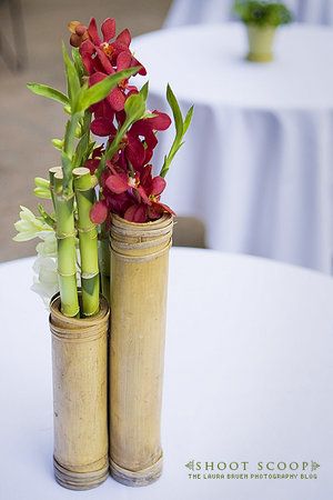 Floral bamboo centerpiece ideas Bamboo Centerpieces, Asian Party Decorations, Asian Wedding Themes, Asian Party Themes, Asian Party, Bamboo Planter, Beach Dinner, Bamboo Decor, Ikebana Flower Arrangement