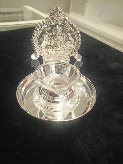 Gajalakshmi deepam with plate Kamakshi Deepam Silver, Kamakshi Deepam, Pooja Items, Silver Pooja Items, Gold Earrings Models, Brass Items, Lakshmi Images, Vedic Mantras, Silver Items