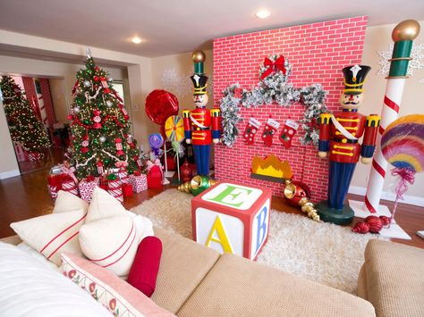 Actress Garcelle Beauvais is thrilled to be a part of HGTV's Celebrity Holiday Homes. The holiday makeover is a kid-friendly delight, which features six-foot-tall toy soldiers, a faux red brick fireplace, oversized ornaments and a candy cane theme tree. Toyland Christmas Decorations, Toyland Christmas Theme, Christmas Toyland, Bright Christmas Decorations, Oversized Ornaments, Garcelle Beauvais, Realistic Artificial Christmas Trees, Spruce Christmas Tree, Fun Christmas Decorations