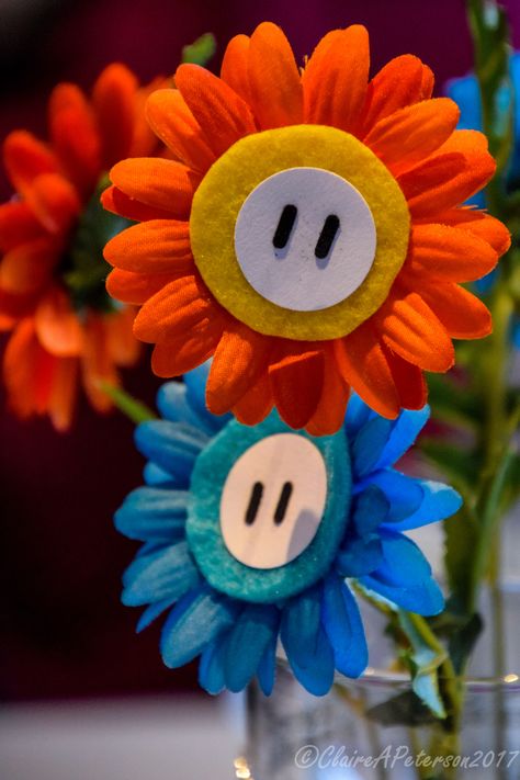 Mario fire and ice flowers centrepieces Ice Flowers, Fire Flower, Flower Decor, Fire And Ice, Flower Centerpieces, Themed Wedding, Flower Decorations, Mario, Craft Projects