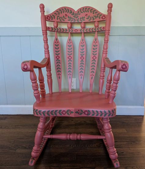 Bold pink rocking chair with tons of hand painted details. ❤️ #handpaintedrockingchair #paintedrockingchair #rockingchair #handpainted #handpaintedfurniture #colorfulhome #colorfulinterior #interiordesign #folkart #boho #bohostyle #bohodecor #botanicalart #botanical #uniqueinteriors #fusionmineralpaint #handpainteddecor #smithfieldva #virginiaartist #upcyclefurniture #upcycle Folk Art Chair, Christmas Chairs, Pink Rocking Chair, Painted Rocking Chairs, Hand Painted Chairs, Wooden Rocking Chairs, Christmas Chair, Painted Chair, Hand Painted Decor