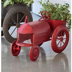 Tractor planter.   Approx $40.   See link.  http://online.findgift.com/gift-ideas/red-metal-vintage-style-tractor-planter-pid-379640/ Tractor Planter, Tractor Barn, Creative Planter, Outdoor Crafts, Boys Bathroom, Creative Gardening, Small Planter, San Martin, Unique Gardens