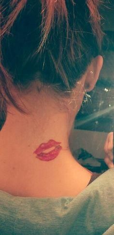 #thightattoo #thightattoos #tattoo #womenthightattoo #flowerthightattoo #tattoos #usa #blackbandarmtattoo #bandtattoo #band #lipstattoo #necktattoo Tattoo Of Lips, Kiss Tattoo On Neck, Lip Print Tattoos, Kiss Tattoo, Kiss Tattoos, Tattoo Neck, Flower Thigh Tattoos, M Tattoos, Perfect Kiss