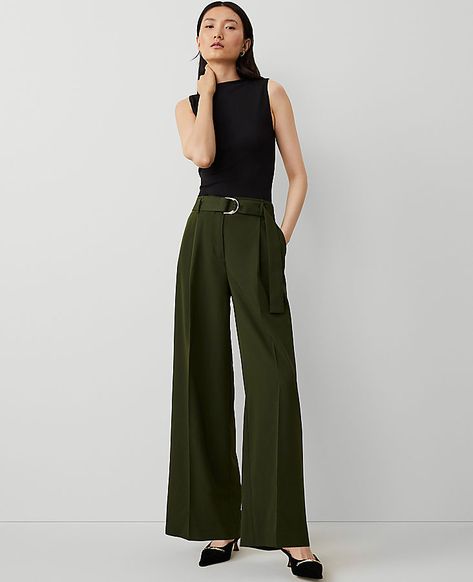 A modern must-have with a statement leg and flattering high waist. Belt loops. Self tie D-ring belt. Front pleats. Front off-seam pockets. Back besom pockets.,Leg Shape:Leg Shape: Wide Leg – a modern must-have with a statement leg and flattering high waist,Rise:High rise: sits 1/2" to 1" below natural waist,Imported:Imported,Fit:Fit: Relaxed & easy,Length:Full length: 31" inseam with 26 1/2" leg opening,Fabrication:73% Polyester, 20% Rayon, 7% Spandex,Garment Care:Machine Washable The Belted Single Pleated Wide Leg Pant by Ann Taylor Size regular - 12 Hunters Green Women's Regular, Wide, Leg, Pants, 73%, Polyester, 20%, Rayon, 7%, Spandex, Machine, Washable Green Dress Pants, High Waisted Pants Outfit, Style Analysis, Fall Workwear, Leg Pants Outfit, Olive Green Pants, Wide Leg Pant, Green Pants, Professional Outfits