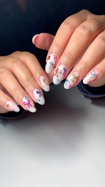 Hayley•Private Nail Artist on Instagram: "Bows on bows on bows 🫠 • Before work is not mine, but we had a damn good time fixing this girl up with the cutest Birthday/Christmas nails everrrr! Inspired by: @nails_by.ry 💕 • • • #nails #nailinspo #bownails #nailart #nailartist #slcnails #slcnailtech #utahnailtech #holidaynails #christmasnails" Summer Bow Nails, How To Draw A Bow On Nails, Confetti Nail Art, Holiday Bow Nails, Bow Christmas Nails, Blue Bow Nails, Christmas Birthday Nails, Christmas Nails Bow, Girly Christmas Nails