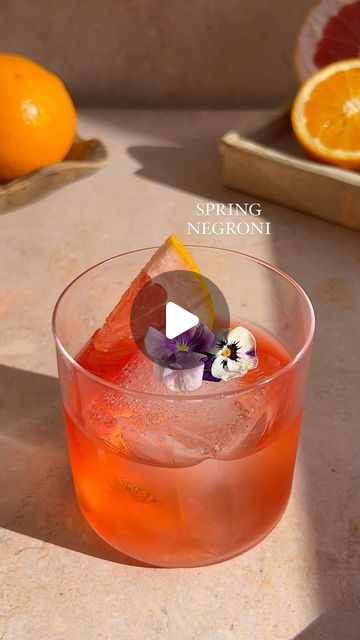 Julianna McIntosh on Instagram: "One of my favorite/easiest cocktails to make during the week this Spring has got to be this SPRING NEGRONI 🌸  It’s an equal parts three ingredient cocktail with rules that you don’t always have to follow. I switched the vermouth for Lillet Rouge and we made a strawberry Campari (recipe is on my site), I mean really… what could go wrong… NOTHING  Here’s how to make it at home: In a mixing glass add 1 oz lillet rouge 1 oz strawberry infused Campari 1 oz gin, I used the Hendricks flora adora to make this more floral forward but use what you like! Add ice and mix together.  Strain over a large cube and garnish with fresh grapefruit!  Xoxo, cheers! #negroni #springrecipes #drinkrecipe #gincocktails" Hendricks Flora Adora Recipes, Hendricks Flora Adora, Easiest Cocktails, Negroni Recipe, Almond Meal Cookies, Cookie Videos, Spring Cocktails, Citrus Twist, Easy Cocktails