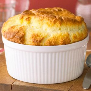 Light, airy, and beautifully golden, this souffle main dish tastes even better when made with a combination of cheeses. Sponge Pudding Recipe, Cheese Souffle Recipes, Sponge Pudding, Lime Desserts, Lemon Sponge, Cheese Souffle, Bistro Kitchen, Souffle Dish, Souffle Recipes