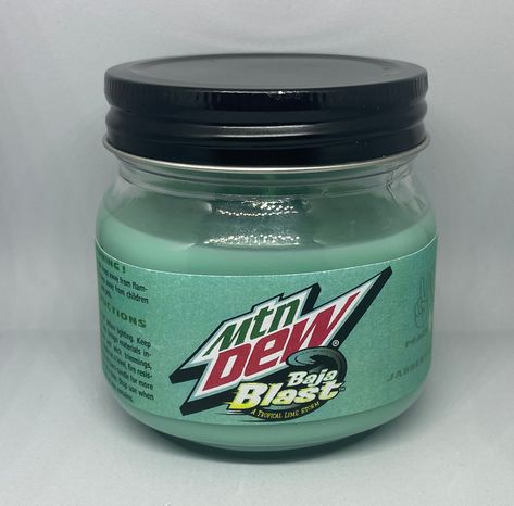 This is a handmade Candle with a Mountain Dew Baja Blast Scent & Color, a cute glass jar with 5.5 oz Baja Blast scented soy wax. * Perfect Gift for a Baja Blast Fan This is made from 100% Soy Wax with natural coloring, and Mountain Dew Baja Blast Scent. Supplies are limited, this item includes Priority Mail Shipping with ONE Day Processing, we estimate you will receive your item in about 3 - 5 days or sooner. Baja Blast Aesthetic, Mtn Dew Baja Blast, Mountain Dew Baja Blast, Baja Blast, Weird Candles, Mtn Dew, Handmade Candle, Mountain Dew, Gift Items