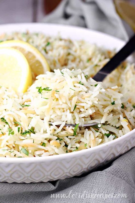 Greek Lemon Rice Pilaf Lemon Rice Pilaf, Side Dish Rice, Lemon Rice Recipe, Greek Rice, Greek Lemon Rice, Rice Pilaf Recipe, Rice Side Dish Recipes, Greek Dinners, Rice Side