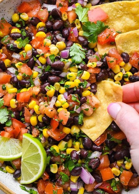 This Black Bean and Corn Salsa is a light and delicious dip that's a perfect appetizer for taco nights. It's easy to make in 10 minutes! Bean Corn Salsa Dip, Black Bean Corn Dip Recipe, Salsa With Corn And Black Beans, Taco Black Beans, Black Bean Avacado And Corn Salsa, Black Bean And Corn Salsa Recipe, Corn And Black Bean Salsa Recipe, Recipes With Canned Black Beans, Easy Corn Salsa Recipe