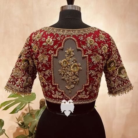 BlouseHousebyMahithaPrasad on Instagram: "Hey Brides! Checkout this intricately embroidered Red Bridal Blouse that is an artistic display of Indian Karigari. What makes this creation unique is the Floral Creeper nestled on the back which is hand embroidered on delicate net which requires great precision. When it comes to bridal designs, customized embroideries like this allow us to turn our bride’s vision into reality. DM us for a customised bridal blouse for your Big Day! #mahithaprasad Zardozi Work Blouse, Saree Blouse Aari Work, Aari Work Saree, Blouse Aari Work, Magam Work, Latest Bridal Blouse Designs, Fashionable Saree Blouse Designs, Wedding Blouse Designs, Aari Work Blouse