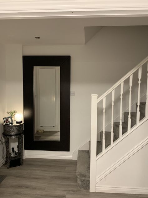 Mirror at the bottom of stairs. Mirror Bottom Of Stairs, Mirror At Bottom Of Stairs, Bottom Of Stairs, Farmhouse Entry, Hallway Mirror, Stair Landing, Big Mirror, Entrance Hall, Accent Mirrors