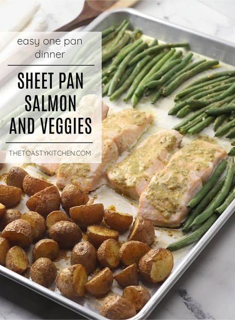 Sheet pan salmon and veggies recipe by The Toasty Kitchen. Sheet pan salmon and veggies is an easy dinner recipe that's cooked entirely on a single sheet pan! Seasoned roasted potatoes, flaky garlic Dijon salmon, and buttery green beans make an easy and nutritious meal. #sheetpansalmon #salmonandveggies #sheetpanmeal #dinnerideas #onepanmeal #recipe Sheet Pan Salmon And Green Beans, Salmon Potatoes Green Beans, Sheet Pan Salmon And Potatoes, Oven Cooked Salmon, Sheet Pan Salmon And Veggies, Salmon And Green Beans, Pan Green Beans, Frozen Salmon Recipe, Salmon Green Beans