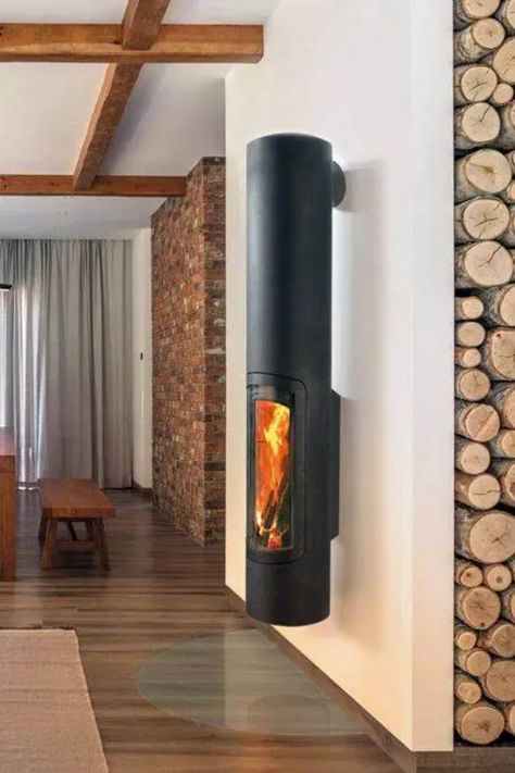 wall hanging unique fireplace in a modern home free hanging wall fireplace home Inso fireplace Inspo wood burning stove Modern Woodburner, Focus Fireplaces, Small Wood Burning Stove, Bedroom Seating Area, Bedroom Seating, Pellet Stove, Forging Metal, Stove Fireplace, Stone House