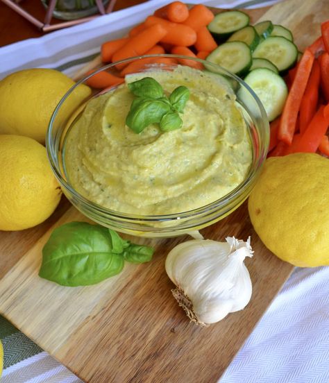 Lemon and Basil Hummus Csid Recipes, Basil Pesto Hummus, Lemon Basil Pesto, Basil Hummus, Pesto Hummus, Lemon Basil, Hummus Recipe, Salty Snacks, Garbanzo Beans