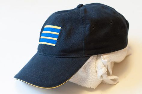 How to Reshape Baseball Caps (with Pictures) | eHow | eHow How To Reshape A Hat, Remove Sweat Stains, Baseball Hitting, Sweat Stains, Wrinkle Remover, Ball Cap, Baseball Caps, Baseball Cap, Baseball Hats