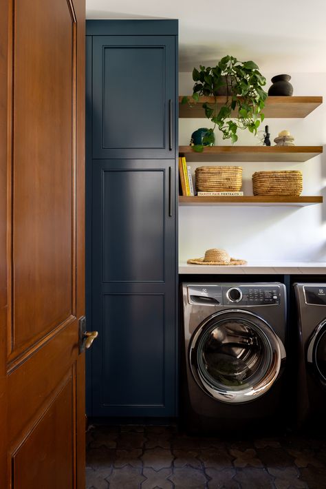 Giving new life to this Mediterranean home by creating an artistic, modern Spanish approach. #ViaJacurProject #laundryroomdesign #bluecabinet #interiordesign #lagunabeach #lidoisland # graceblu #functionallaundry Spanish Home Interior, Black Floor Tiles, Tuscan Style Homes, Mediterranean Tile, Black Floor, Blue Cabinets, Black Tiles, Room Goals, Mediterranean Home