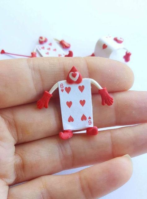 Alice in wonderland hearts of ace #babyshowerideas4u #birthdayparty #babyshowerdecorations #bridalshower #bridalshowerideas #babyshowergames #bridalshowergame #bridalshowerfavors #bridalshowercakes #babyshowerfavors #babyshowercakes Alice In Wonderland Miniatures, Dancing Props, Alice In Wonderland Crafts, Wonderland Decorations, Alice In Wonderland Diy, Alice In Wonderland Decorations, Crea Fimo, Alice In Wonderland Tea Party Birthday, Mad Hatter Hats